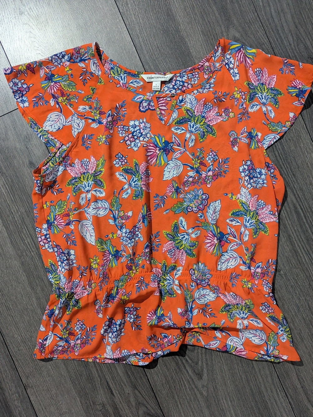 Counterparts Bright Orange Floral Ruffle-Hem Blouse